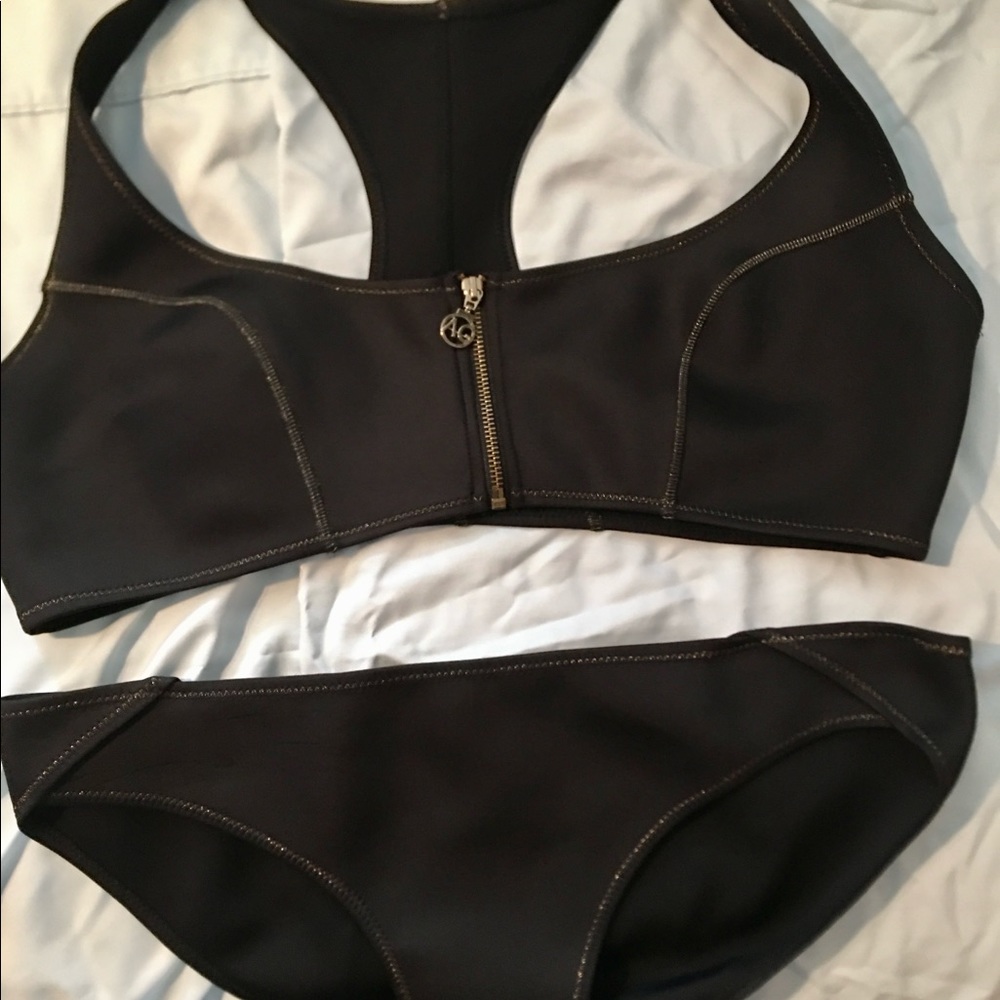 2 piece Ashley Graham swim suit. With zip top